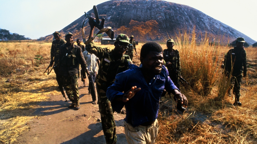 A young man is beaten by MPLA soldiers during Angola’s civil war. The MPLA was applying forceful conscription on villagers, but the man being beaten had rejected the government soldiers’ insistence that he join them. After my pictures (and others from the same series) of this man being shot were published widely in Europe there was public outrage. Many people branded me a vulture and a voyeur in another person’s misery. Many also asked if the soldiers were doing it for the camera and why I hadn’t stopped the beating and shooting. My answer to the first question was that it was already in motion before I began photographing. To the second question, I responded: “Have you ever smelt the pungent odour of men pumped up on adrenaline and in the frenetic throes of killing another man?” But there was a positive byproduct of my published photographs of this incident: the Angolan government investigated the soldiers photographed. 1994 [Jack Picone]
