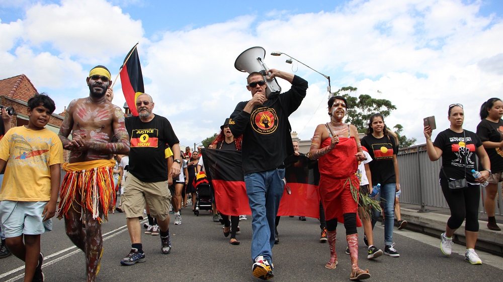  Non-indigenous Australians increasingly shun traditional celebratory barbeques and events of Australia Day to join the protests [Jarni Blakkarly/Al Jazeera] 