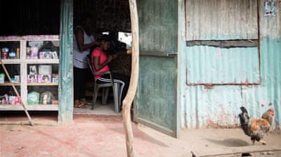 “Phyllis”, who survived an illegal abortion, works in her home salon