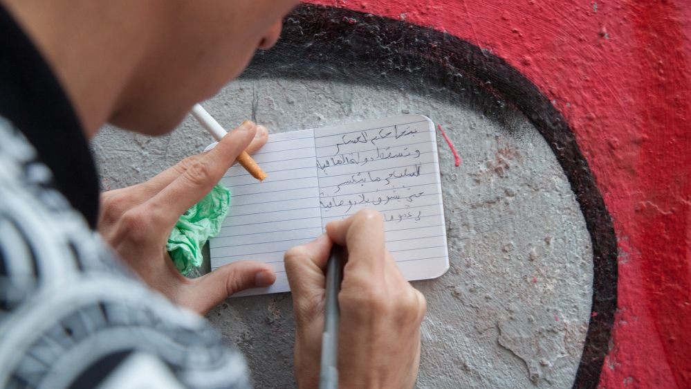 Tadjadit started writing poetry at a young age. Now many of his poems include a political message