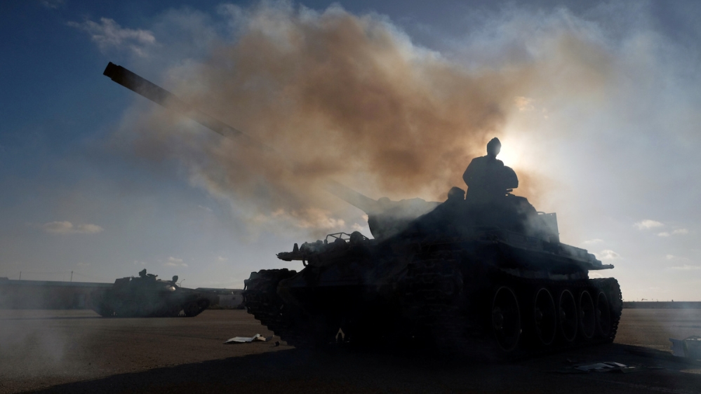 Members of the Libyan National Army commanded by Khalifa Haftar get ready before leaving Benghazi to reinforce the troops advancing to Tripoli in April 2019